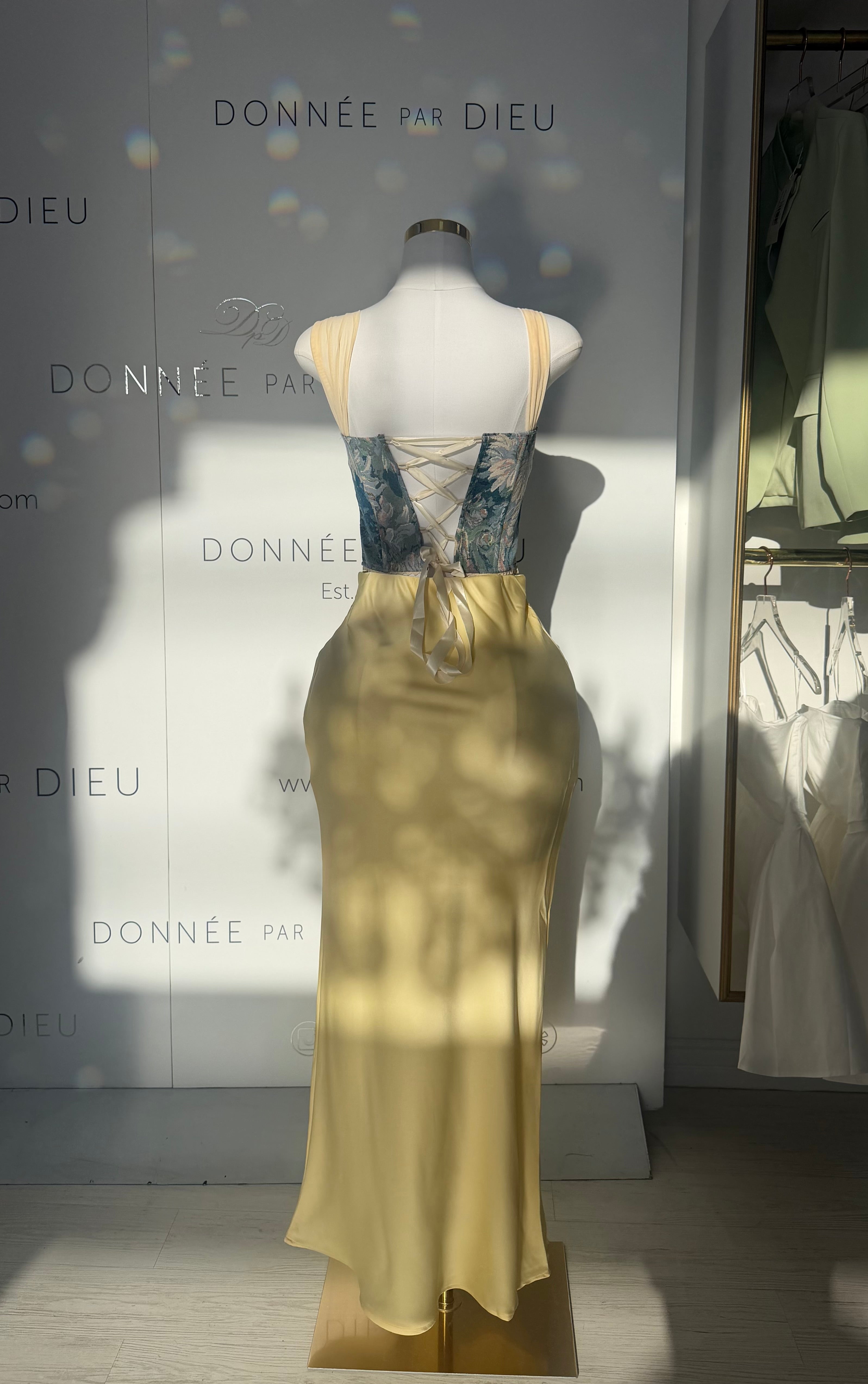 “Yana” satin skirt in yellow