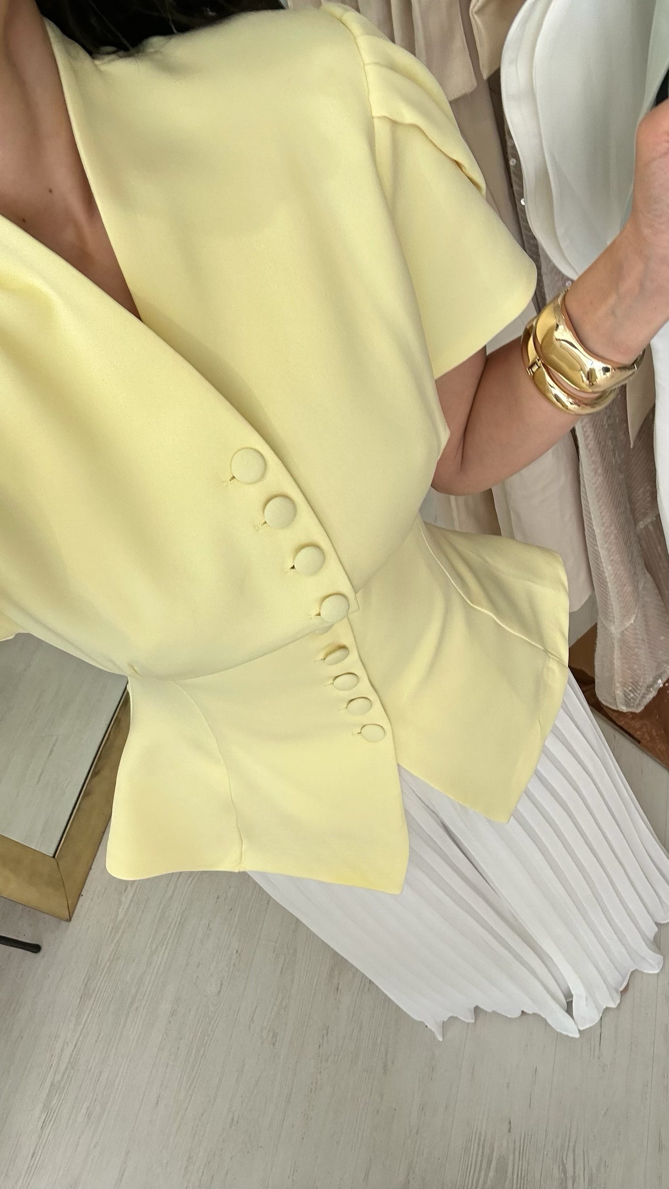 “Bea” buttoned up top